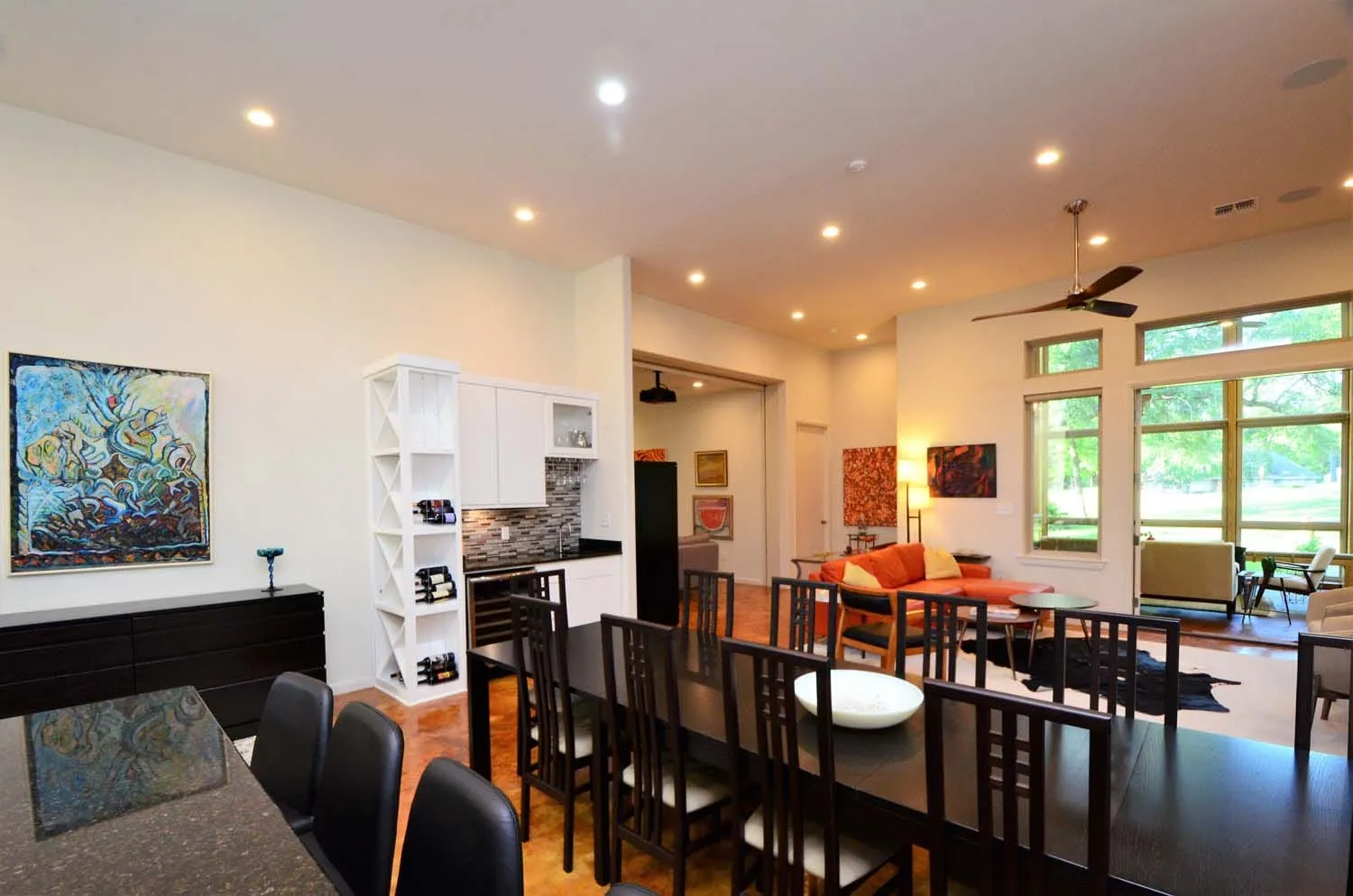 Living and dining area looking out to the patio and lawn