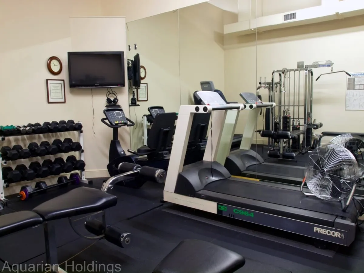 Building fitness room with treadmills and weights