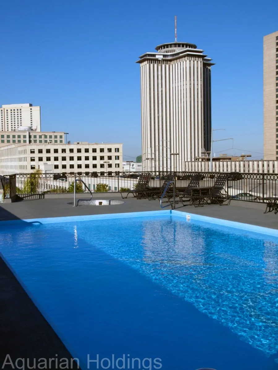 Rooftop pool with the downtown New Orleans skyline behind